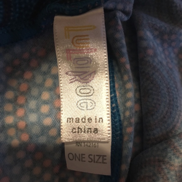 Lularoe blue patterned and orange leggings. - Picture 2 of 3